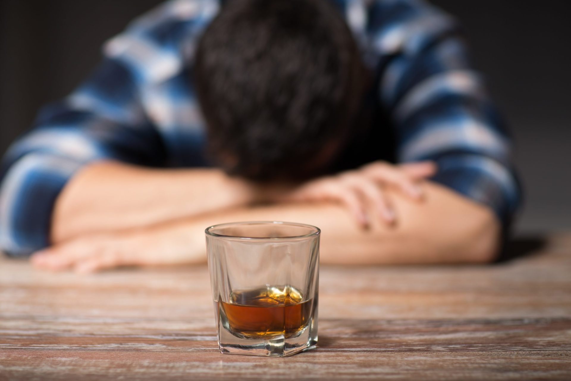 Alcoholism,,Alcohol,Addiction,And,People,Concept,-,Male,Alcoholic,With Person with drink in front of them on the table