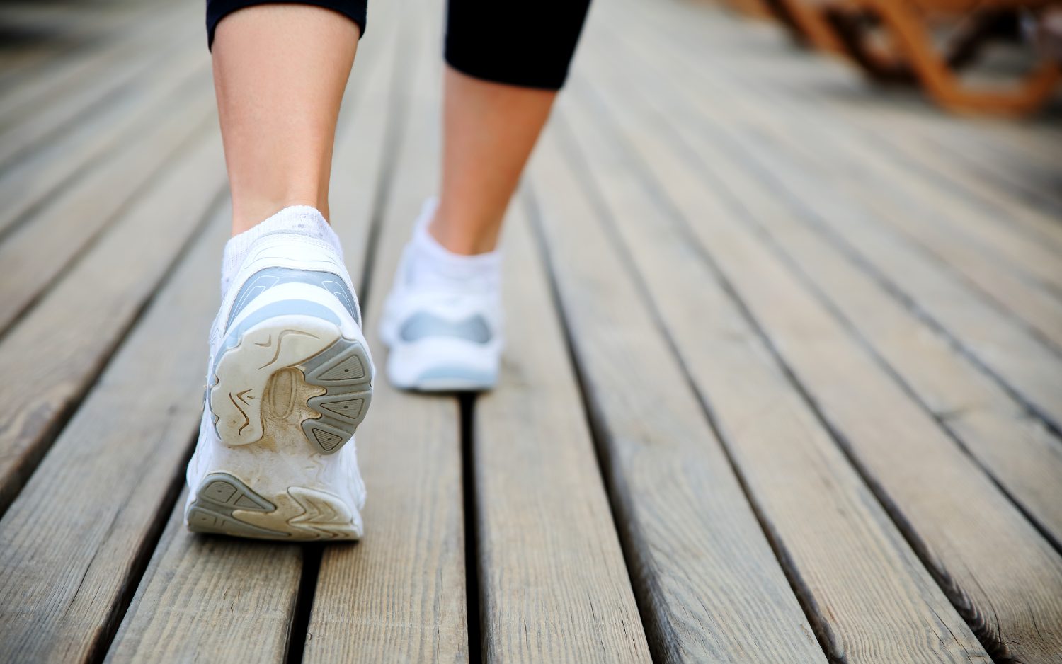 walking ground level image of a person walking