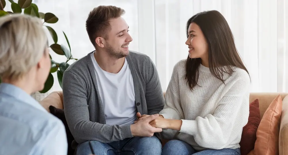 Happy couple in therapy