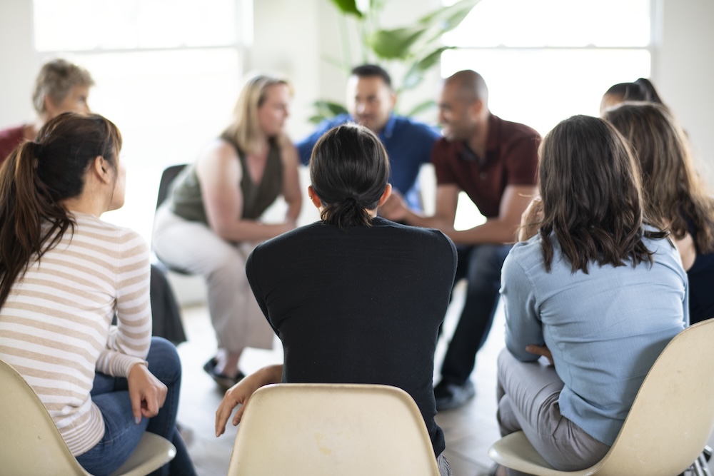 Diverse people in a group session