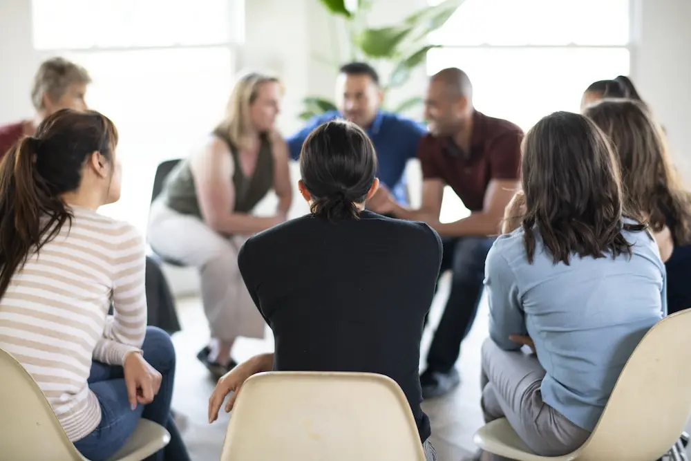 Outpatient Substance Abuse Treatment - New Dimensions Day Treatment Centers in Houston, Katy, and The Woodlands Diverse people in a group session