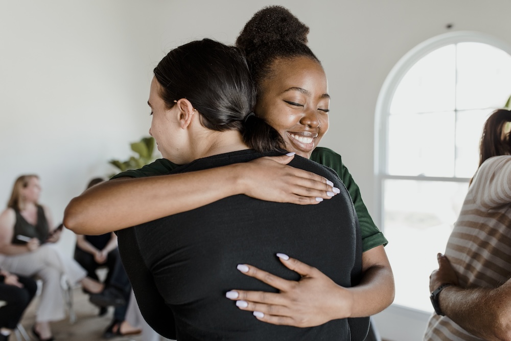 Woman hugging loved one